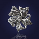 Srebrna-Biżuteria Broszka w kształcie Kwiatka z markazytami.